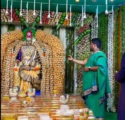 Vasavi Ammavaru Decorated with 1000 Kg Sweets in Nellore
